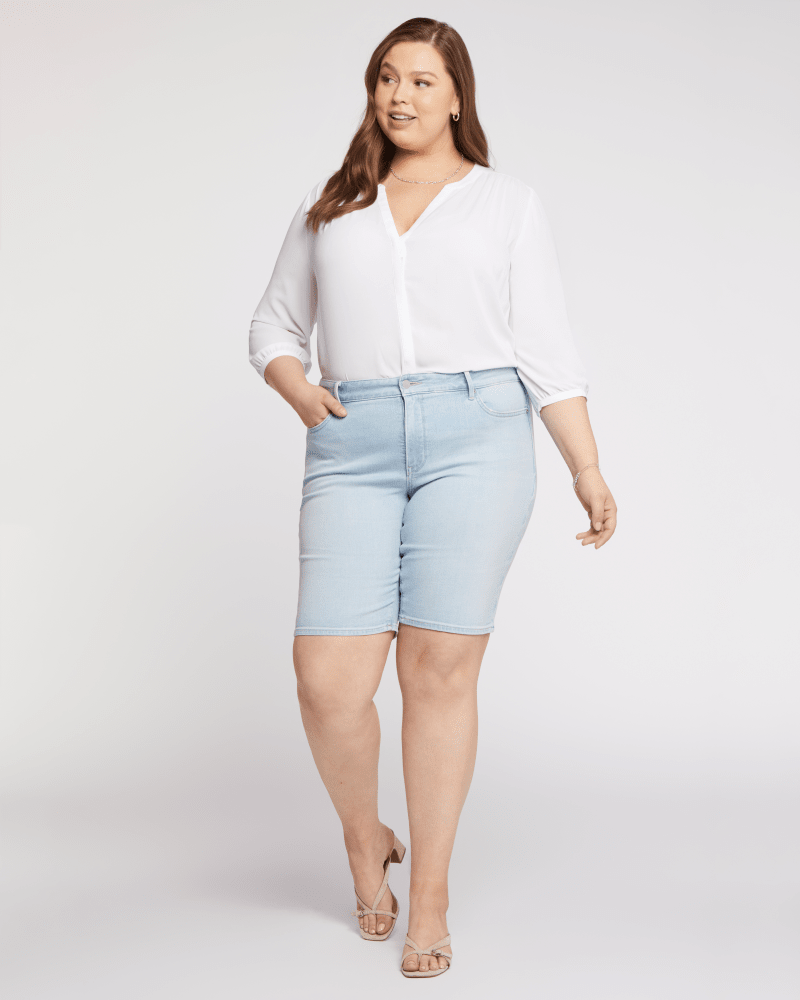 Front of a model wearing a size 14W Briella Short in Dunes by NYDJ. | dia_product_style_image_id:200300